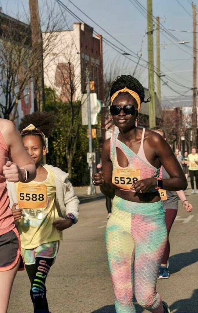 Mami Bowedes and her daughter run a 5K