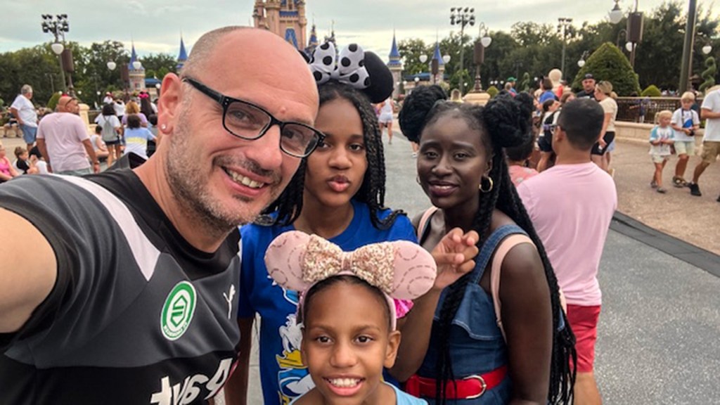 Tony and Mami Bowedes and their daughters at Disney World